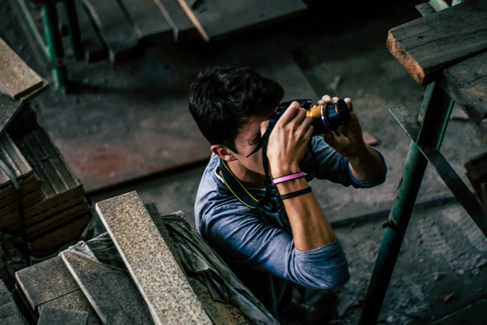 Site worker photographing completed work